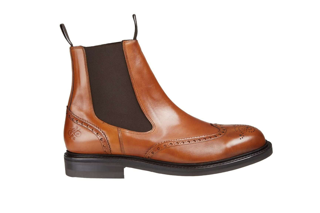 Bespoke Leather Chelsea Boot in tan. Handcrafted design with Field and Moor signature on the back. Made in Italy.